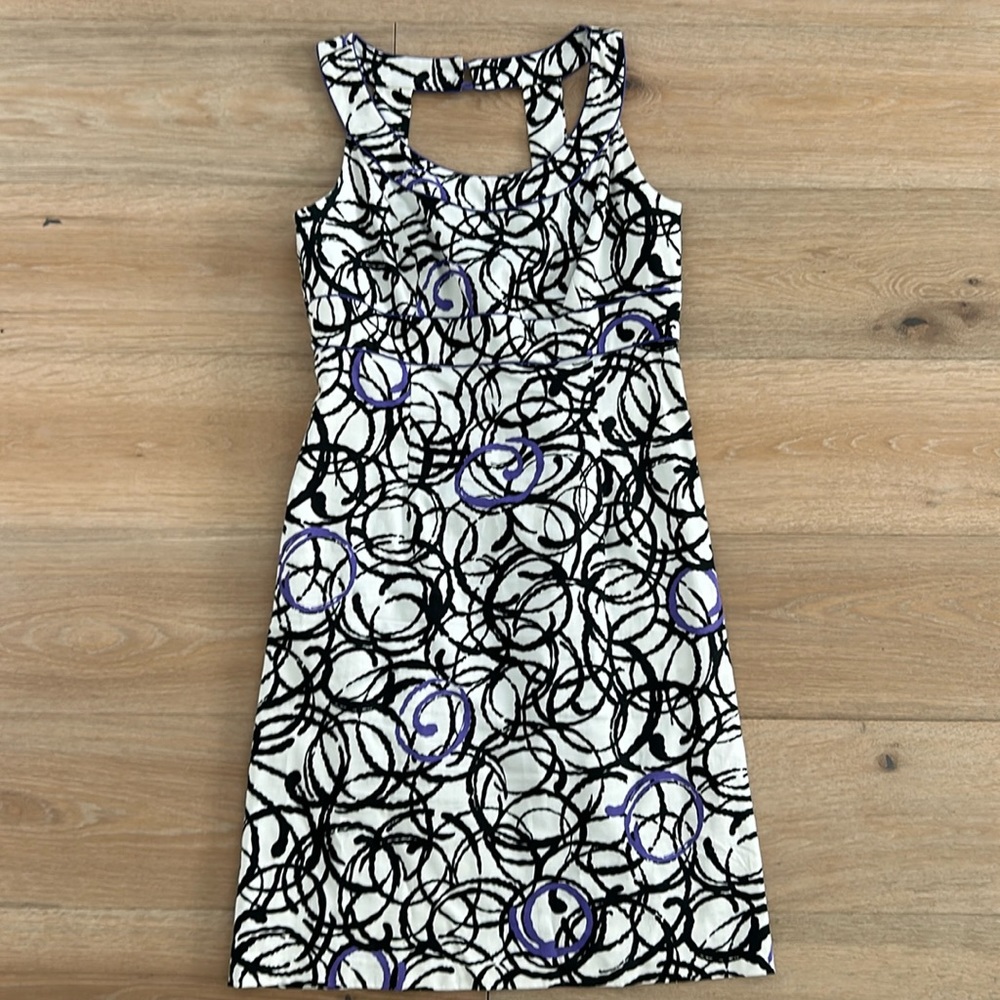 Sheri Martin sleeveless sheath dress.